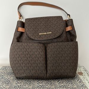 Michael Kors Backpack. Large size, brown with the signature MK logo